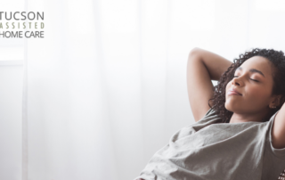 A woman takes a break to relax and practice self-care, something vital for professional caregivers.