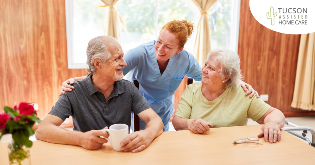 A good caregiving environment can benefit both caregiver and clients, as shown here by this caregiver and her 2 clients.