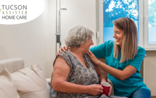 A home care provider compassionately tends to a senior client in their home.