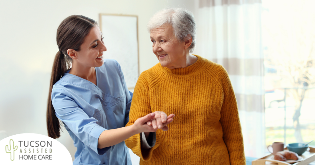 Professional caregivers, like this one who is helping a senior client walk, require a number of qualities and skills to provide compassionate personal care.